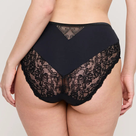 Black lace underwear on a plain background