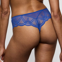 Load image into Gallery viewer, Blue lace underwear worn by a person on a plain background
