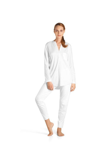 Made from 100% soft mercerised pima cotton, these button fronted pyjamas are the perfect item for lounging or sound sleep. Elastic waist band and cuffed ankles ensure a comfortable and cosy fit.  100% Pure Cotton Made in Europe Machine washable. Off-White.