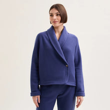 Load image into Gallery viewer, Soft fleece wrap-over long-sleeved Laurence Tavernier bedjacket.
It closes with a single Corozo button. The shawl collar and curved front detail add the final touches of style to this soft, light and cosy bedjacket.
