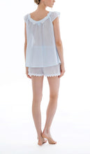 Load image into Gallery viewer, Azure Shorty Pyjama set. The top has a short sleeve with a gently rounded lace trimmed neckline. The shorts are loose fitting and have an elasticated waist and are lace trimmed on the hem. Made in Germany from the finest pure cotton mousseline, Celestine nightwear is diaphanous, offering perfect sleep without heaviness. Celestine nightwear, dressing gowns and short robes drop from the shoulder, therefore one size fits all.  Composition: 100% Pure Swiss Cotton 100% Cotton Lace
