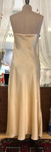 Load image into Gallery viewer, Full length, heavy weight pure silk satin nightdress with delicate contrasting embroidered lace coveing the entire bust. Spaghetti straps, with a V neck style. The skirt is full length and cut on the bias for full movement. It has a lace trimmed side slit for ease of movement.  100% Pure Silk Satin Made in Italy Machine washable
