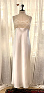 Beautiful full length, heavy weight pure silk nightdress. Delicious ecru lace on the empire style bustline, lined with chiffon silk for coverage. The nightgown spaghetti straps and is cut on the bias for full movement when sleeping. Total luxury! Fabric Content: 100% Pure Silk. Made in Italy. Machine washable.