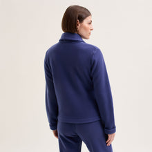 Load image into Gallery viewer, Night Blue. Soft fleece wrapover long sleeved bedjacket.  It closes with a single Corozo button. The shawl collar and curved front detail add the final touches of style to this soft, light and cosy bedjacket.   Made in Portugal. Available in Azur Blue Composition: 70% Polyester, 30% Viscose. Machine Washable.
