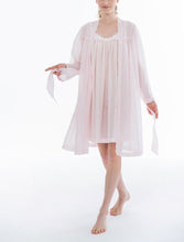 Load image into Gallery viewer, Short (102cm), Kimono Style short robe. Frilled detail on the hem edges and cuffs. The robe has belt and pocket. Made in Germany from the finest mousseline, this short, diaphanous robe is a 100% pure cotton. It offers the wearer perfect cover without heaviness. Celestine garments are addictive, so watch out. Once tried, there is no turning back! Celestine nightwear, dressing gowns and short robes drop from the shoulder, therefore one size fits all. Composition:  100% Pure Swiss Cotton Machine Washable
