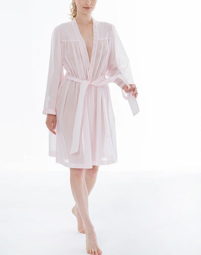 Short (102cm), Kimono Style short robe. Frilled detail on the hem edges and cuffs. The robe has belt and pocket. Made in Germany from the finest mousseline, this short, diaphanous robe is a 100% pure cotton. It offers the wearer perfect cover without heaviness. Celestine garments are addictive, so watch out. Once tried, there is no turning back! Celestine nightwear, dressing gowns and short robes drop from the shoulder, therefore one size fits all. Composition:  100% Pure Swiss Cotton Machine Washable