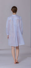 Load image into Gallery viewer, Short (95cm) long sleeve nightgown. Round high neck with button detail. Beautiful embroidery on the front, sleeves and back yoke. Narrow lace on the cuffs. Flared skirt for ease of movement when sleeping. Made in Germany from the finest pure Swiss cotton, Celestine nightdresses are diaphanous, offering perfect sleep without heaviness. Fabric composition:  100% Pure Swiss Cotton. 100% Guipure Lace. Machine Washable.
