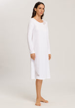 Load image into Gallery viewer, Made from 100% soft mercerised knitted cotton. This is a lovely 3/4 length long sleeve nightgown. Rounded neckline with an appliqué lace inset at the neck &amp; front hem. Perfect item for lounging or sound sleep. Deliciously comfortable for sleeping and lounging.  Length: 110cm  Composition: 100% Pure Cotton 100% Polyester Lace  Made in Europe Machine washable. Soft White.
