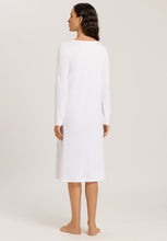 Load image into Gallery viewer, Made from 100% soft mercerised knitted cotton. This is a lovely 3/4 length long sleeve nightgown. Rounded neckline with an appliqué lace inset at the neck &amp; front hem. Perfect item for lounging or sound sleep. Deliciously comfortable for sleeping and lounging.  Length: 110cm  Composition: 100% Pure Cotton 100% Polyester Lace  Made in Europe Machine washable. Pure White.
