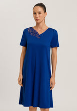 Load image into Gallery viewer, Made from 100% soft mercerised knitted cotton. This is a lovely Short Sleeve nightgown. Rounded lace detail at the neck. Light and airy to wear in bed.  Deliciously comfortable for sleeping and lounging.  Length: 110cm  Composition: 100% Pure Cotton 100% Polyester Lace. Indigo Blue..

