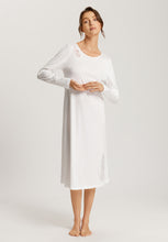 Load image into Gallery viewer, Soft White Attractive 100% soft mercerised knitted cotton. This is a Long Sleeve 3/4 length nightgown with a gentle round neckline. It has a lace inset on the neckline mirrored by a deep lace inset on the opposite hem. Light and airy to wear in bed.  Deliciously comfortable for sleeping and lounging.
Length: 110cm
Composition: 100% Pure Cotton, 100% Polyester Lace.
Made in Europe
Machine washable

