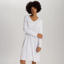 Load image into Gallery viewer, Embrace modern comfort with Hanro Cotton Silk - Long Sleeved Nightdress. This piece features a soft, mercerised cotton interlock construction, enhanced by subtle silk details. The long sleeves and ideal length of 100cm makes it perfect for a stylish and comfortable night's rest or relaxed lounging.
