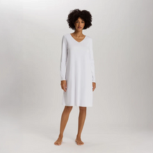 Load image into Gallery viewer, Embrace modern comfort with Hanro Cotton Silk - Long Sleeved Nightdress. This piece features a soft, mercerised cotton interlock construction, enhanced by subtle silk details. The long sleeves and ideal length of 100cm makes it perfect for a stylish and comfortable night's rest or relaxed lounging.

