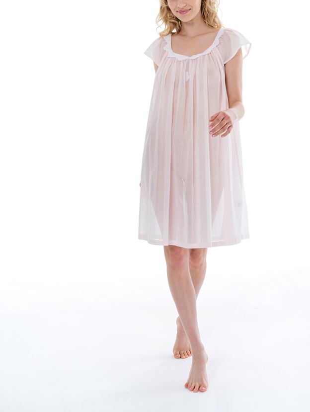 Short (97cm) cap nightgown. Lace details on the rounded neckline. Flared skirt for ease of movement when sleeping. Made in Germany from the finest pure Swiss cotton, Celestine nightdresses are diaphanous, offering perfect sleep without heaviness. Celestine nightwear, dressing gowns and short robes drop from the shoulder, therefore one size fits all.  Fabric composition:  100% Pure Swiss Cotton. 100% Guipure Cotton Lace. Machine Washable.