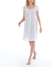 Load image into Gallery viewer, Short (97cm) cap nightgown. Lace details on the rounded neckline. Flared skirt for ease of movement when sleeping. Made in Germany from the finest pure Swiss cotton, Celestine nightdresses are diaphanous, offering perfect sleep without heaviness. Celestine nightwear, dressing gowns and short robes drop from the shoulder, therefore one size fits all.  Fabric composition:  100% Pure Swiss Cotton. 100% Guipure Cotton Lace. Machine Washable.
