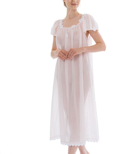 Full length (123cm) short sleeve nightgown. Lace details on the gentle rounded neckline and sleeve edge. Wide lace band on the hem. Flared skirt for ease of movement when sleeping. Made in Germany from the finest pure Swiss cotton, Celestine nightdresses are diaphanous, offering perfect sleep without heaviness. Celestine nightwear, dressing gowns and short robes drop from the shoulder, therefore one size fits all.  Fabric composition:  100% Pure Swiss Cotton. 100% Guipure Cotton Lace. Machine Washable.