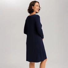Load image into Gallery viewer, Image of the back of a woman wearing the Cotton silk long sleeve nightdress.
