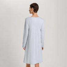 Load image into Gallery viewer, Image of the back of a woman wearing the Cotton silk long sleeve nightdress.
