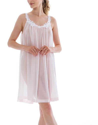 Smart short (93cm) sleeveless nightgown. There are lace details on the rounded neckline & spaghetti strap. Flared skirt for ease of movement when sleeping. Made in Germany from the finest pure Swiss cotton, Celestine nightdresses are diaphanous, offering perfect sleep without heaviness. Celestine nightwear, dressing gowns and short robes drop from the shoulder, therefore one size fits all.  Fabric composition:  100% Pure Swiss Cotton. 100% Guipure Cotton Lace. Machine Washable.