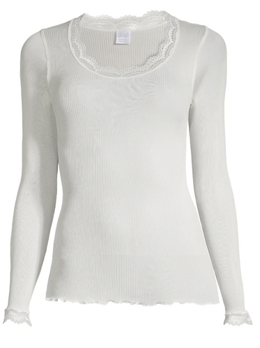 Ivory. Long Sleeve style delicate fine ribbed knit fabric in pure silk organza with the most elegant and feminine French leavers lace at the neckline and cuff. The lace is certified and numbered as true “Dentelle de Calais®”. Super-soft touch with no side seams, the construction is for the ultimate in comfort. Featuring a gently scooped neckline this top allows for a multiple of uses, as underwear or outerwear.  100% Silk All Oscalito Silk is certified GOTs. Machine washable  (In stock, 3 day delivery)
