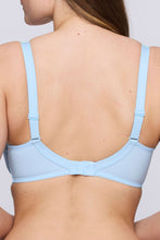 Load image into Gallery viewer, Deauville Milky Blue fashion colour is a fabulous full cup underwired bra. 
It consists of three panels, to give the best structured support. 
A panel on the bottom and side, provide a lift and gathers the breasts neatly. The Lace panel at the top gives a feminine and airy lightness to the style. 
The lace continues onto the comfortable adjustable strap with a delicate bow at the base.
The back of the bra fastened with hook / eye closure. 
