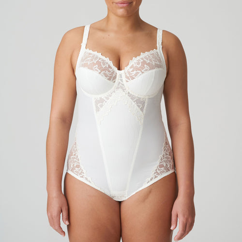 It has three-section underwire and is finished with abundant embroidery on the cups, straps, leg openings and front section. The firm cups give an excellent lift while the side sections on the cups nudge the bust towards the centre. The cups also are deeper than any other Prima Donna bra, which ensures better uplift for largest sizes. The central section of the body smooths away lumps and bumps on tummy and waist, creating a flowing figure.