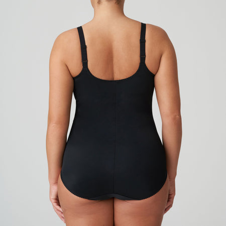 It has three-section underwire and is finished with abundant embroidery on the cups, straps, leg openings and front section. The firm cups give an excellent lift while the side sections on the cups nudge the bust towards the centre. The cups also are deeper than any other Prima Donna bra, which ensures better uplift for largest sizes. The central section of the body smooths away lumps and bumps on tummy and waist, creating a flowing figure.