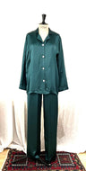 Bottle Green. Classic pure silk 'men's style' pyjamas. They are made from19mm 100% pure heavy weight Silk Satin. One seam on the leg for extra comfort.  Mother-of-pearl buttons, elastic waist on the back of the trouser with a drawstring waist to the front. French seams throughout for that added comfort. Made in Florence, 
Composition: Pure Silk Satin
Made in Italy
Machine washable.