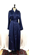 Made in Florence, full length (130cm) beautiful Pure Silk dressing gown.  The wide belt is integrated into the back of the robe creating a sleek and smooth style. It has a kimono style collar and two concealed side pockets. French seams throughout for softness. Wonderful to wear over any item or nightwear, or to match with our Clara Rossi Night/Slips and Pyjamas. Composition:  Pure Silk Satin  Care:  Machine or Hand wash in cool water. Details: Loose fitting for comfort and movement. 