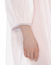 Load image into Gallery viewer, Short (96cm) long sleeve nightgown. Lace details on the gently rounded neckline, cuffs &amp; hemline. Flared skirt for ease of movement when sleeping. Made in Germany from the finest pure Swiss cotton, Celestine nightdresses are diaphanous, offering perfect sleep without heaviness. Celestine nightwear, dressing gowns and short robes drop from the shoulder, therefore one size fits all.  Fabric composition:  100% Pure Swiss Cotton. 100% Guipure Lace. Machine Washable. Rose.
