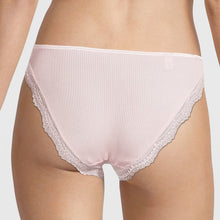 Load image into Gallery viewer, Rear view of a model wearing rosewood pink ribbed silk and calais lace briefs against a plain white background.
