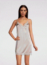 Load image into Gallery viewer, SALE Classic, short silk satin night/slip. Made from 92% silk satin and with a little Elastane for stretch and movement.  Chantilly lace on the V neck and hem. Adjustable spaghetti straps and all French seams for softness when wearing. This garment is perfect for sleepwear or as a slip under clothing. Generous sizing, if in doubt select the smaller size.   Oscalito Silk is Certified GOTs Fabric Content: 92% Silk 8% Elastane Made in Italy. Machine washable. Champagne. 

