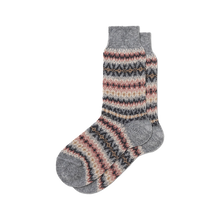Load image into Gallery viewer, A pair of gray knit cashmere socks with a multicolor Fair Isle pattern of pink, beige, and dark gray stripes, shown against a plain white background.

