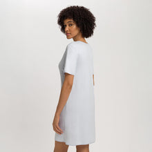 Load image into Gallery viewer, Image of the back of a woman wearing the Cotton silk short sleeve nightdress.
