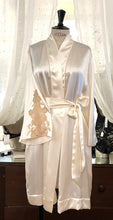 Load image into Gallery viewer, Ivory/Ecru. Beautiful Pure Silk Robe.  Generous Belted at the waist contrasting lace on the sleeve and matching black piping on the Kimono style collar. Two concealed side pockets. Wonderful to wear over any item or nightwear, or to match with our Verdiani Night/Slips.  100% Silk Satin. Lace: 78% Nylon, 16% Elastane, 6% Polyester. Made in Italy. Machine washable. Loose fitting for comfort and movement. 
