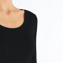 Load image into Gallery viewer, A close up of the black silk cashmere top. Showcasing the soft edging around the neck.
