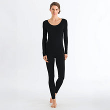 Load image into Gallery viewer, A woman wearing the Silk Cashmere long sleeve top and Leggings in Black.
