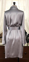 Load image into Gallery viewer, Made in Florence, Italy, Short (knee length) beautiful Pure Silk Robe.  Belted at the waist with concealed side pockets. Kimono style collar. French seams throughout for softness. Wonderful to wear over any item or nightwear, or to match with our Clara Rossi Night/Slips and Pyjamas.  Composition :  Pure Silk Satin. Silver.

