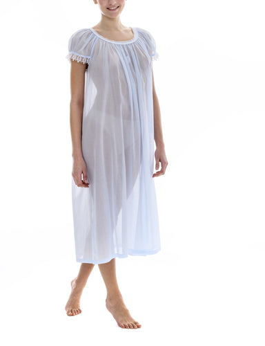 Azure Full length (123cm) short sleeve nightgown. Gorgeous 100% Guipure Cotton Lace at the gently rounded neckline and sleeve hem. Flared skirt for ease of movement when sleeping. Made in Germany from the finest pure cotton mousseline, Celestine nightdresses are diaphanous, offering perfect sleep without heaviness.
Celestine nightwear, dressing gowns and short robes drop from the shoulder, therefore one size fits all. 
Composition: 100% Pure Swiss Cotton, 100% Guipure Cotton Lace.
Machine Washable.
