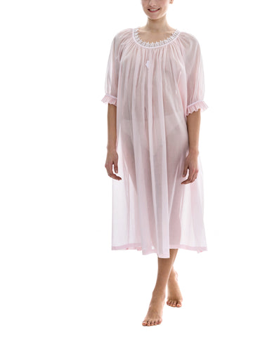 Rose Full length (123cm) 3/4 length sleeve nightgown. Gorgeous 100% Guipure Cotton Lace at the gently rounded neckline and a frilled detail at the sleeve hem. Flared skirt for ease of movement when sleeping. Made in Germany from the finest pure cotton mousseline, Celestine nightdresses are diaphanous, offering perfect sleep without heaviness.
Celestine nightwear, dressing gowns and short robes drop from the shoulder, therefore one size fits all. 
Composition: 100% Pure Swiss Cotton, 100% Guipure Cotton Lace