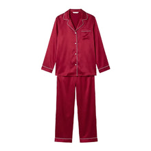 Load image into Gallery viewer, Luxury raspberry pink silk satin pyjama set with long sleeves, button-front shirt, soft pink contrast piping and matching full-length trousers.
