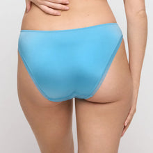 Load image into Gallery viewer, Blue underwear worn by a person on a plain background
