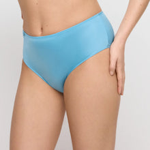Load image into Gallery viewer, Light blue bikini bottom worn by a person on a plain background
