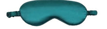 Load image into Gallery viewer, Our own 100% Pure Mulberry&nbsp;Silk Eye Mask.&nbsp;&nbsp;Our sleep mask has a delicate piped detail&nbsp;around its edge for&nbsp;extra elegance and is plumply padded for comfort.&nbsp;The back strap is also covered in silk for smoothness and style. Sleeping with an eye mask cuts out artificial and natural light, allowing for a deeper sleep without bulk. Using a silk&nbsp;sleep mask smooths the skin&nbsp;around the eyes, like a mini spa treatment! Teal.
