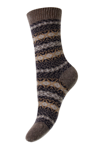 FairIsle Mink. There is nothing cosier than cashmere socks! It is as if someone plugged you into a heat source. These are made in Scotland by Pantherella from the finest cashmere. They are unrivalled for their quality, style and comfort.  85% Cashmere 15% Nylon (for durability).