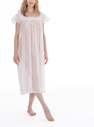 Full length (121cm) cap sleeve nightgown. Lace details on the square neckline. Flared skirt for ease of movement when sleeping. Made in Germany from the finest pure Swiss cotton, Celestine nightdresses are diaphanous, offering perfect sleep without heaviness. Celestine nightwear, dressing gowns and short robes drop from the shoulder, therefore one size fits all.  Composition:  100% Pure Swiss Cotton. 100% Guipure Cotton Lace. Machine Washable. (In stock, 3-day delivery)