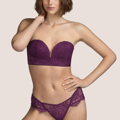 Deep Plunge Bustier. Beautiful formed deep plunge non-wire bandeau Bustier. The cups are made entirely of silk with cover of Leavers lace. The silk spaghetti straps are detachable. The colour Tourmaline is an Aubergine shade, perfect for all skin tones. This Bustier top is made to be seen! Perfect for inner or outerwear.  Fabric Content: Polyester: 66%, Silk:14%, Polyamide:10%, Cotton: 8%, Elastane: 2% Lace: Leavers.