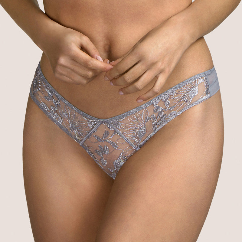 Beautiful low-cut Tanga style G/String.  The embroidery at the front is in a geometric panel. The tulle back is perfectly smooth under clothing. Andres Sarda is famous for its innovation in its use of fabrics. Tina in Metallic Silver is a perfect example.