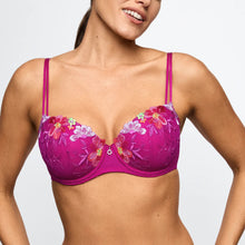 Load image into Gallery viewer, Woman wearing a pink floral bra against a plain background
