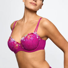 Load image into Gallery viewer, Woman wearing a pink floral bra against a light gray background
